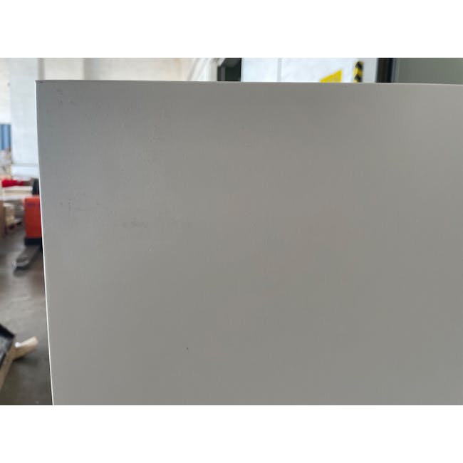 (As-is) Brexley Coffee Table - 5 - Industrial warehouse setting, Large, smooth, gray surface, Office or workshop