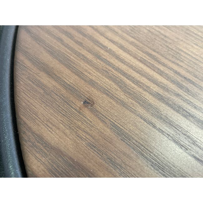 (As-is) Gwyneth Round Side Table - Black, Cocoa - 1 - 3 - Wooden surface, close-up view, small dark stain, irregular shape