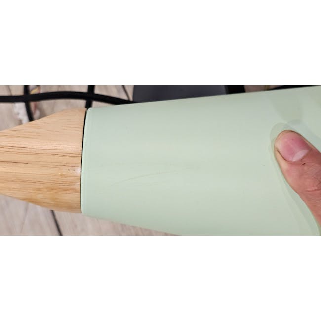 (As-is) Kenne Cone Pendant Lamp - Mint - 4 - Light green cylindrical object, wooden handle, person's hand holding, light